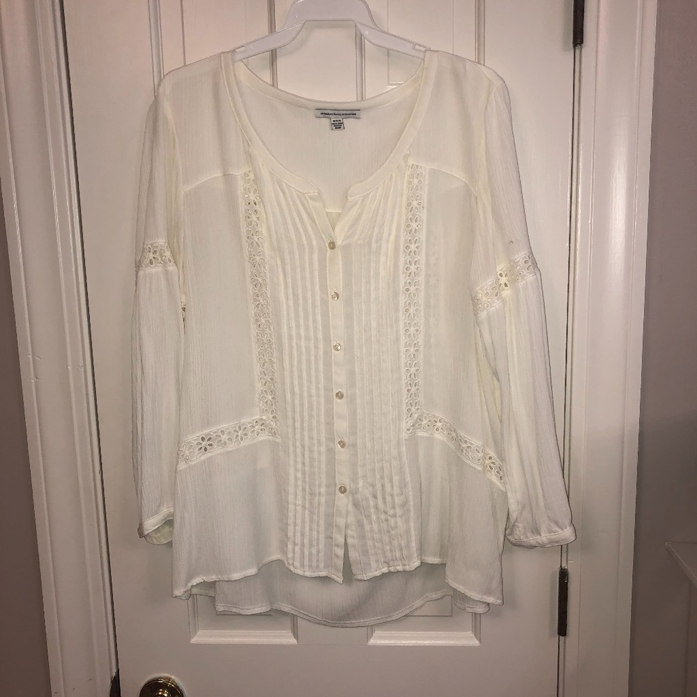 flowy blouse with eyelet detail